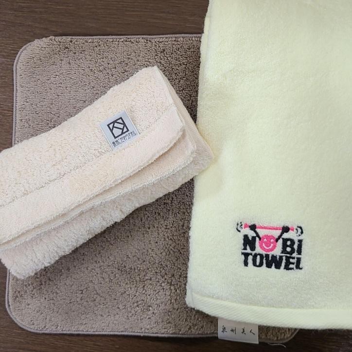 <font color ='blue',size='2'>Back: a face towel suitable for cycling or jogging, Left: a hand towel I would take with me for long-distance race or trail running, Right: a stretchy towel, sometimes I use this when stretching my body </font>